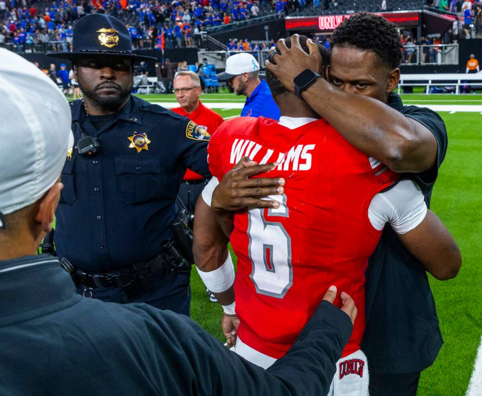 UNLV quarterback Hajj-Malik Williams (6) is comforted on the field after a gritty performance a ...