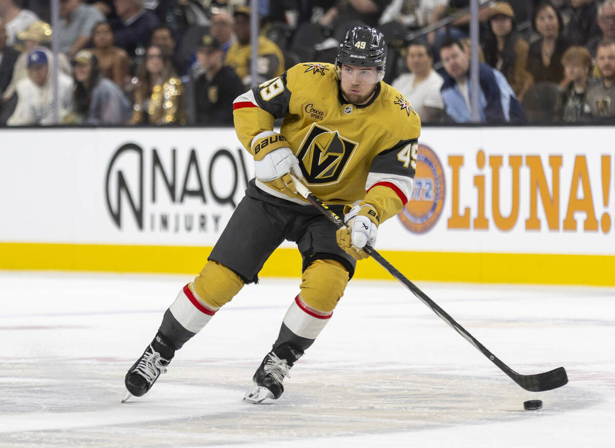 Golden Knights center Ivan Barbashev (49) controls the puck during the first period of the NHL ...