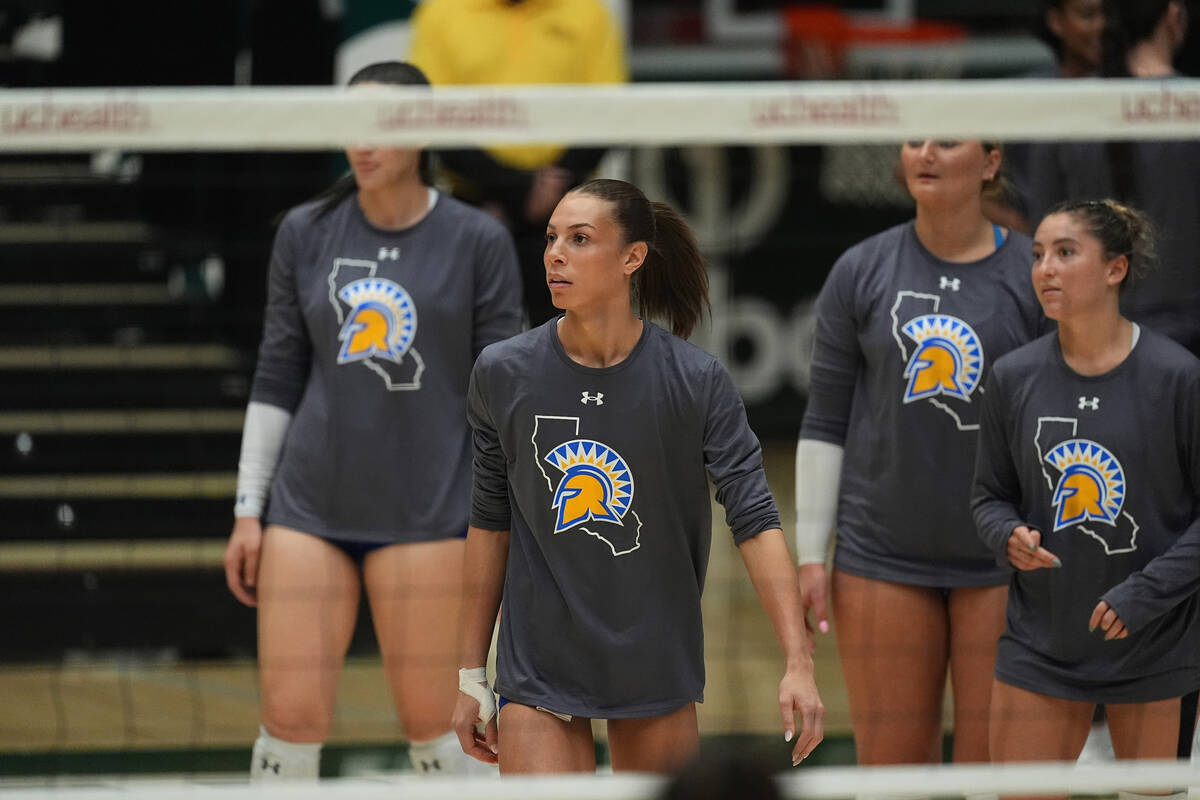 San Jose State outer hitter Blaire Fleming warms up with teammates for the first set of an NCAA ...