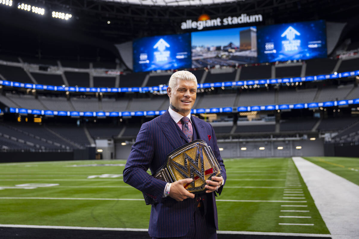 WWE superstar Cody Rhodes poses with the Undisputed WWE Championship belt at Allegiant Stadium ...