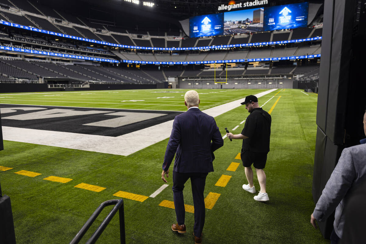 WWE superstar Cody Rhodes walks onto the field at Allegiant Stadium on Wednesday, Oct. 23, 2024 ...