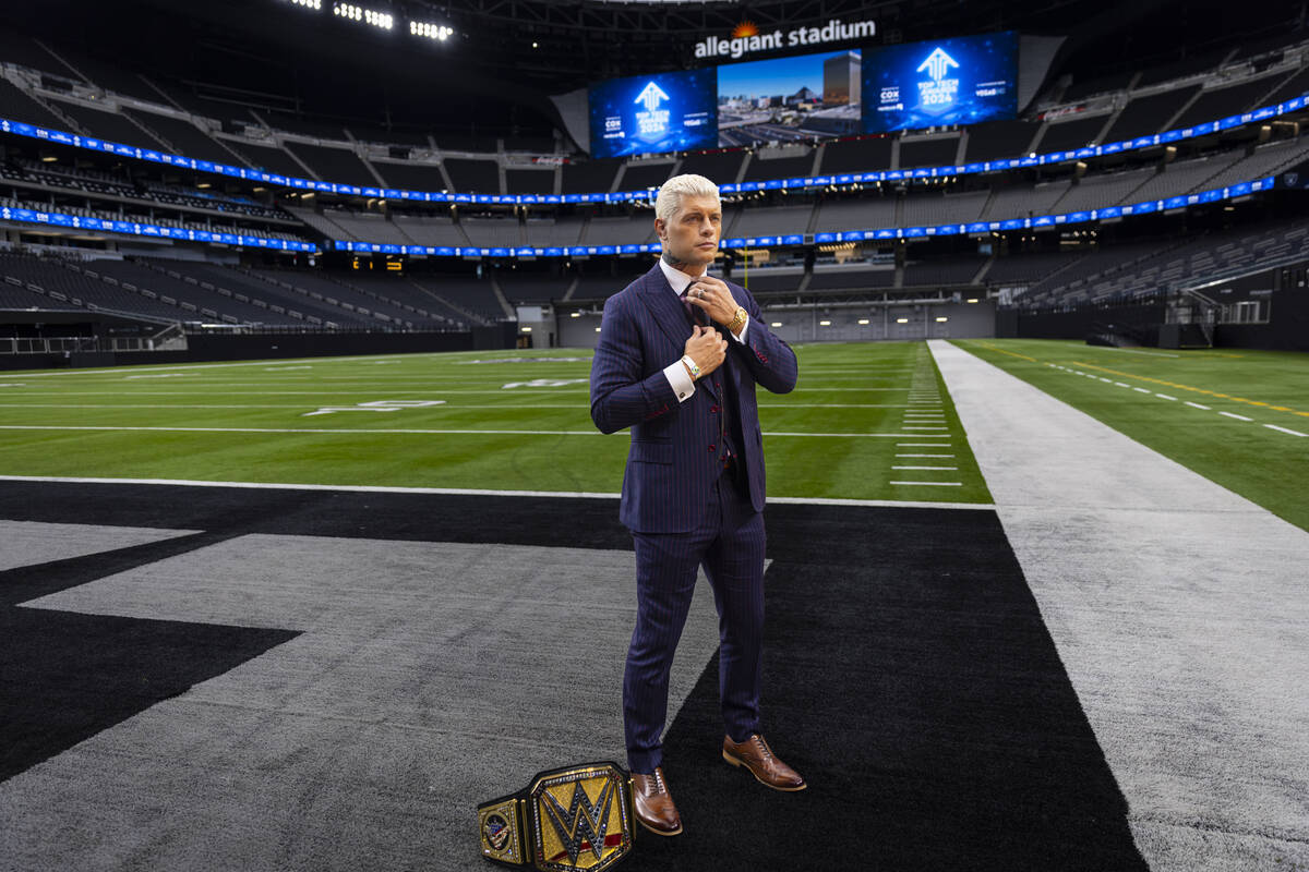 WWE superstar Cody Rhodes poses with the Undisputed WWE Championship belt at Allegiant Stadium ...