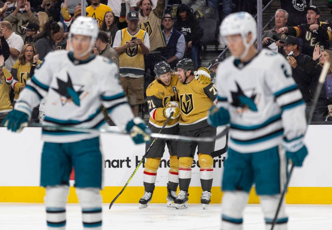 Golden Knights center William Karlsson (71) and left wing Tanner Pearson (70) celebrate a goal ...