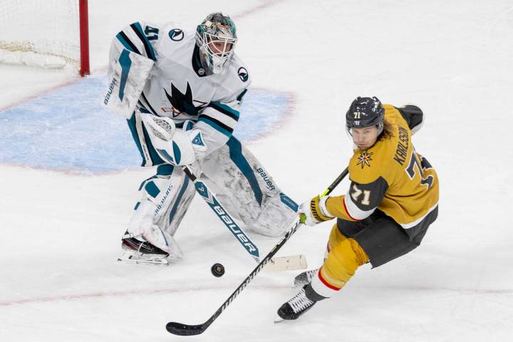 San Jose Sharks goaltender Vitek Vanecek (41) shoots the puck past Golden Knights center Willia ...