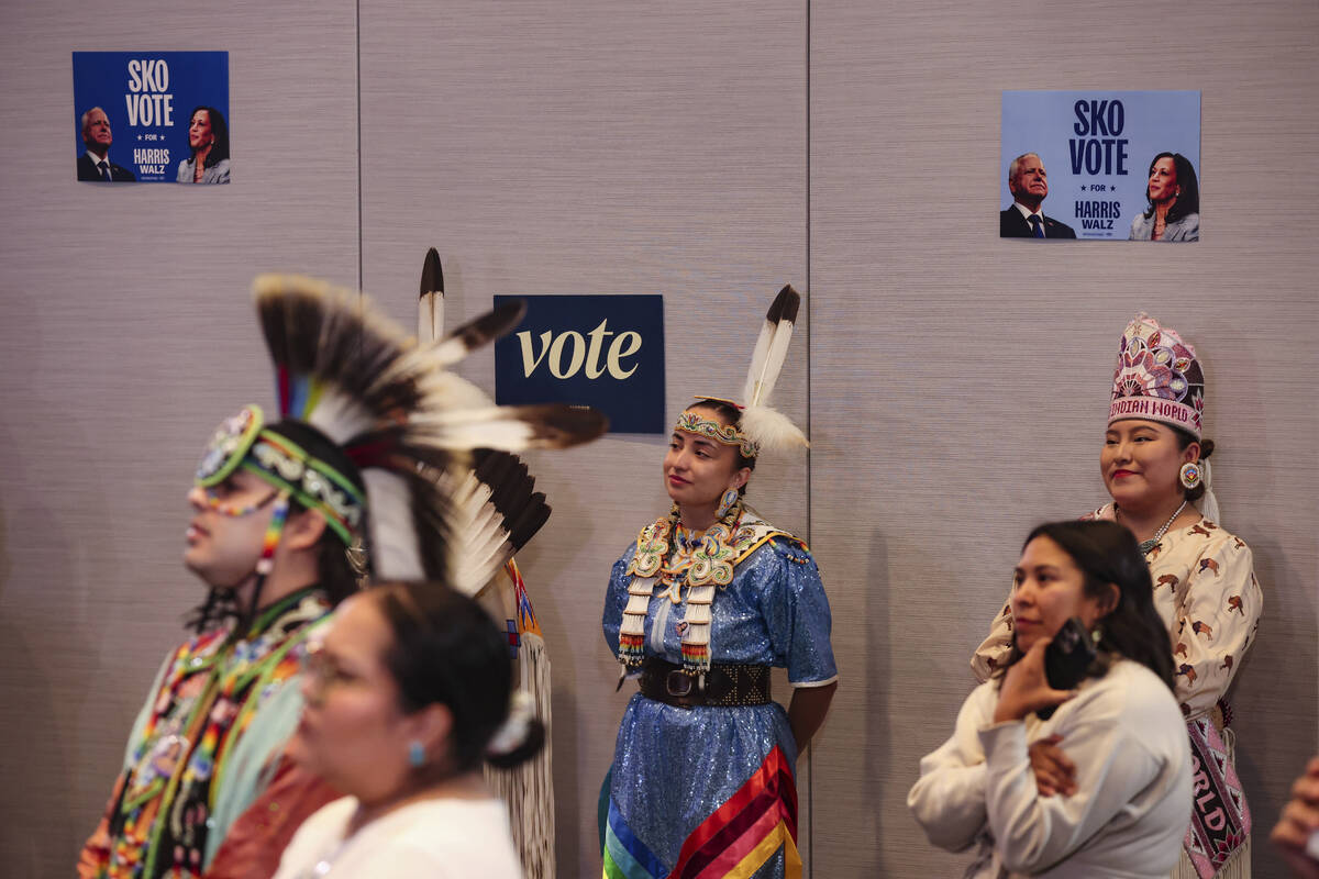 The audience listens to Democratic vice presidential candidate Tim Walz speak at a "Native ...