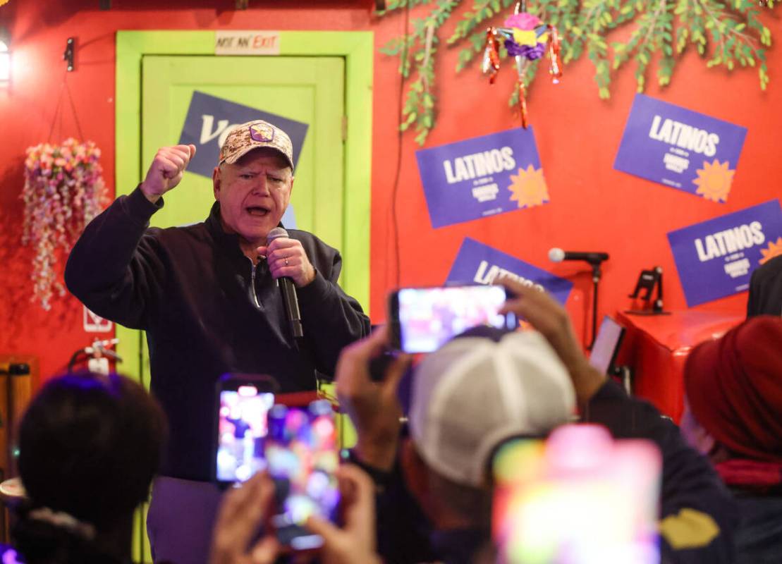 Democratic vice presidential candidate Tim Walz addresses supporters at a Latinos con Harris-Wa ...