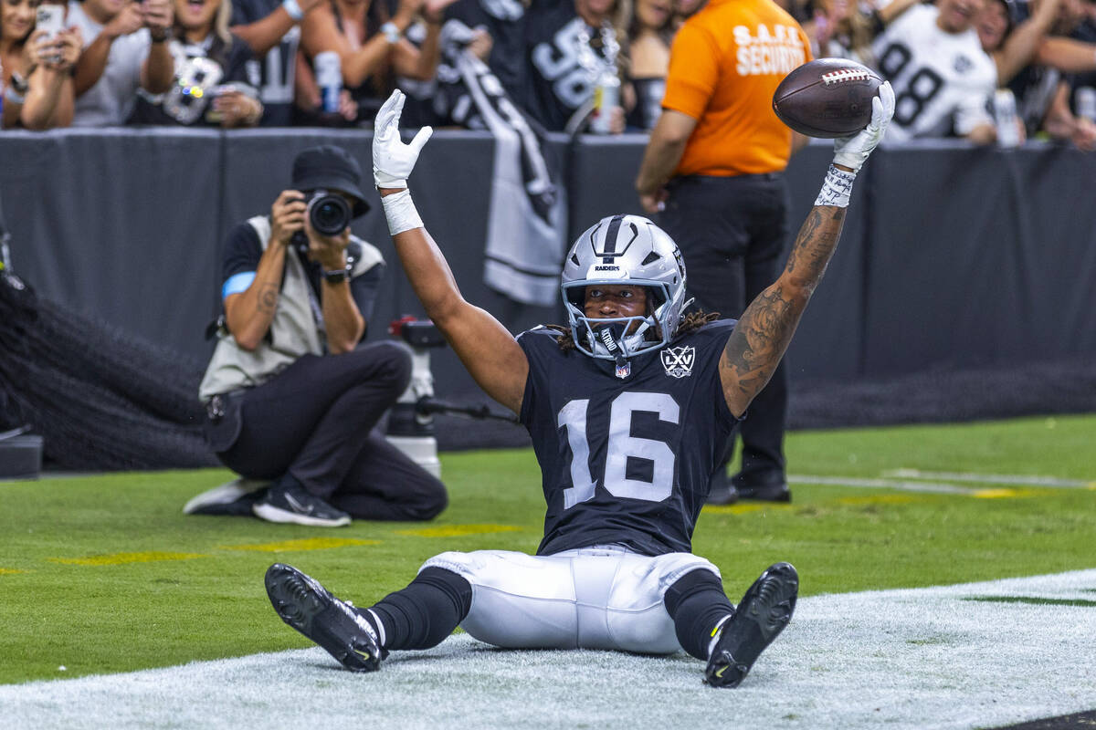 Raiders wide receiver Jakobi Meyers (16) celebrates a pass reception in the end zone as Carolin ...