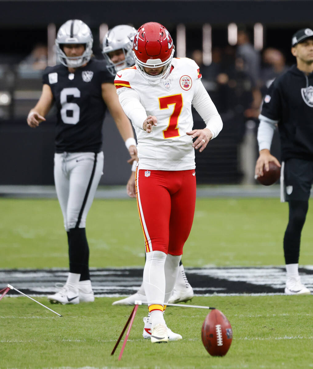 Raiders punter AJ Cole (6) and place kicker Daniel Carlson (2) watch as Kansas City Chiefs plac ...