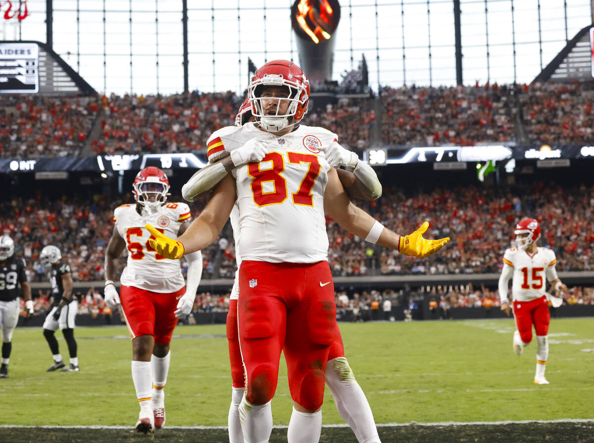 Kansas City Chiefs tight end Travis Kelce (87) reacts after scoring a touchdown during the firs ...