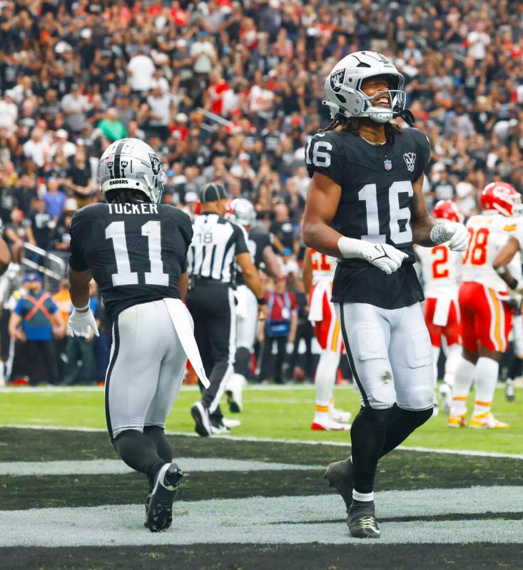 Raiders wide receiver Jakobi Meyers (16) celebrates his touchdown with his teammate wide receiv ...