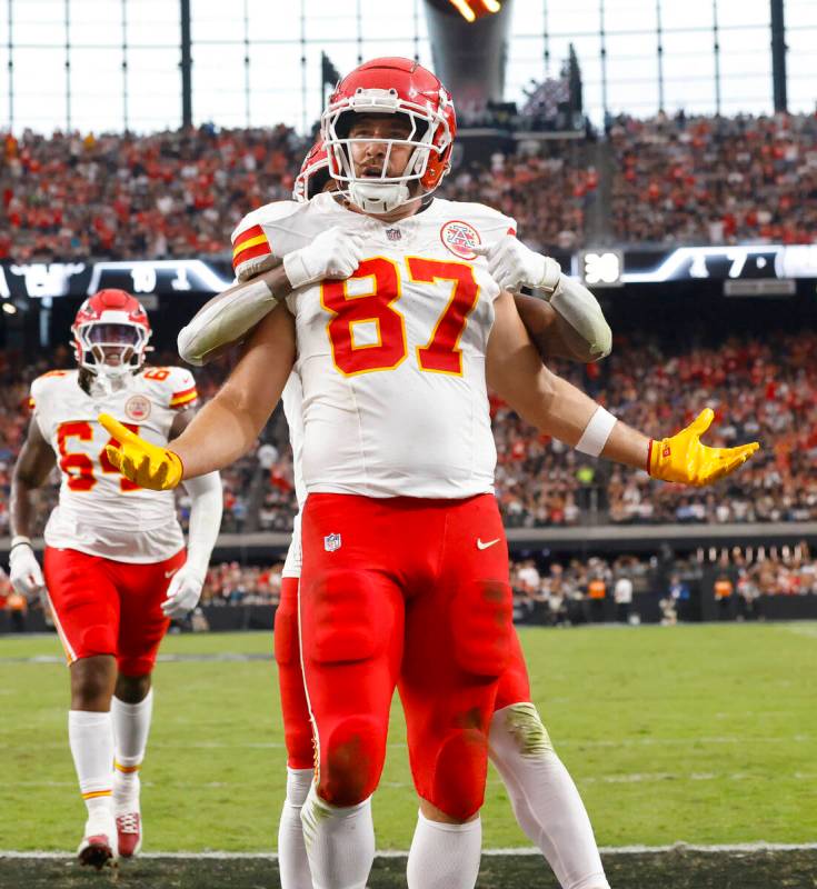 Kansas City Chiefs tight end Travis Kelce (87) reacts after scoring a touchdown during the firs ...