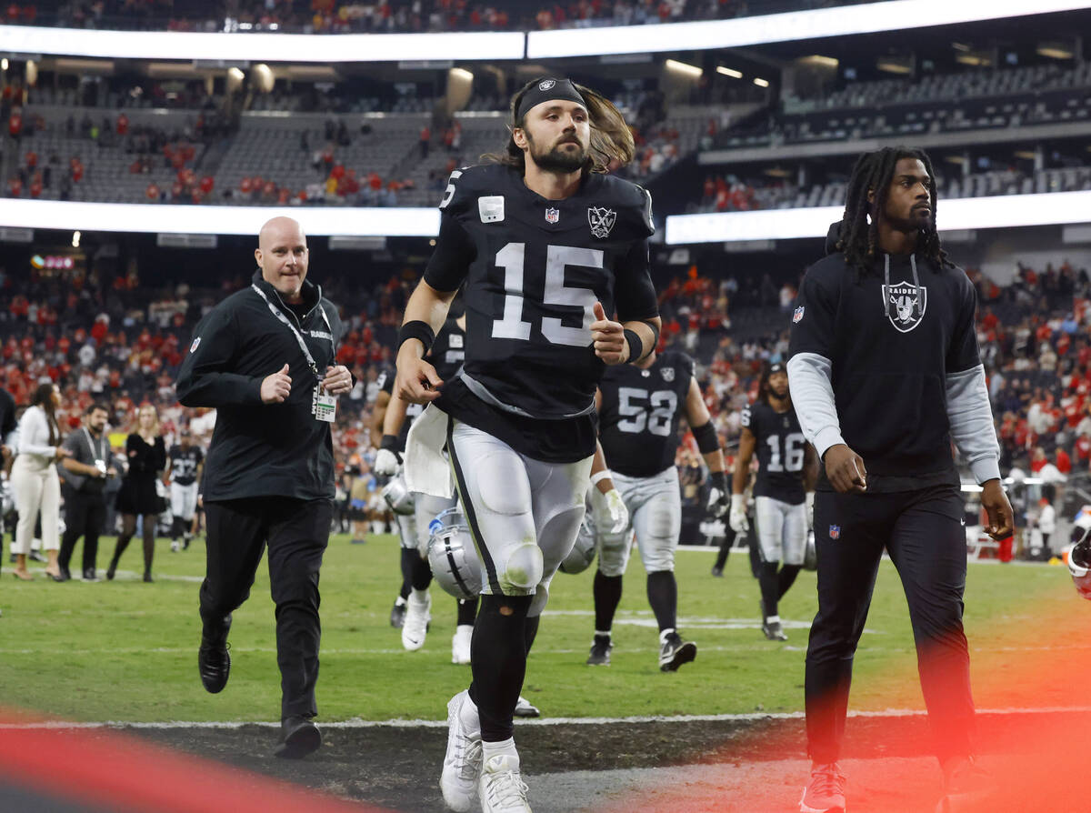 Raiders quarterback Gardner Minshew (15) leaves the field after an NFL game against Kansas City ...