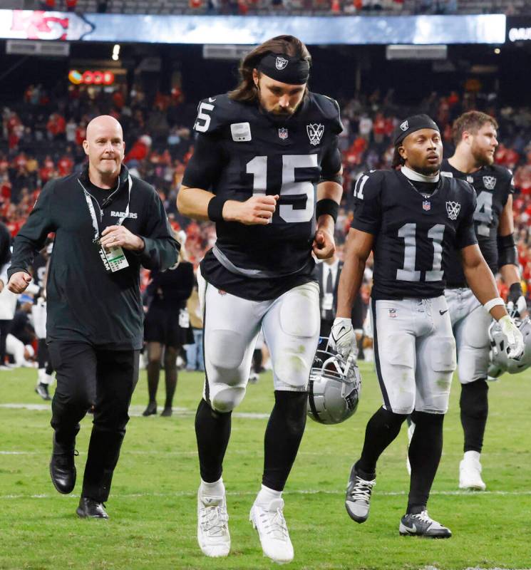 Raiders quarterback Gardner Minshew (15) leaves the field after an NFL game against Kansas City ...