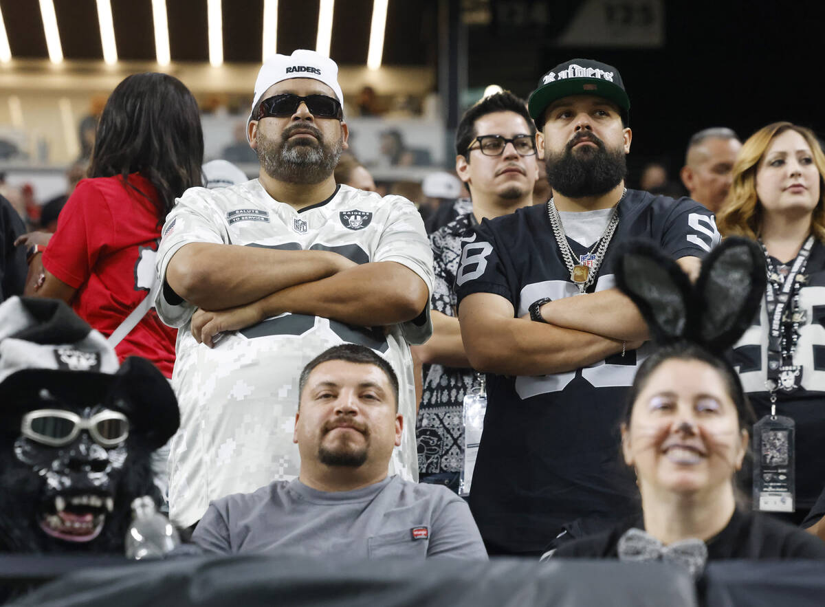 Raiders fans watch the last minutes of an NFL game against Kansas City Chiefs at Allegiant Stad ...