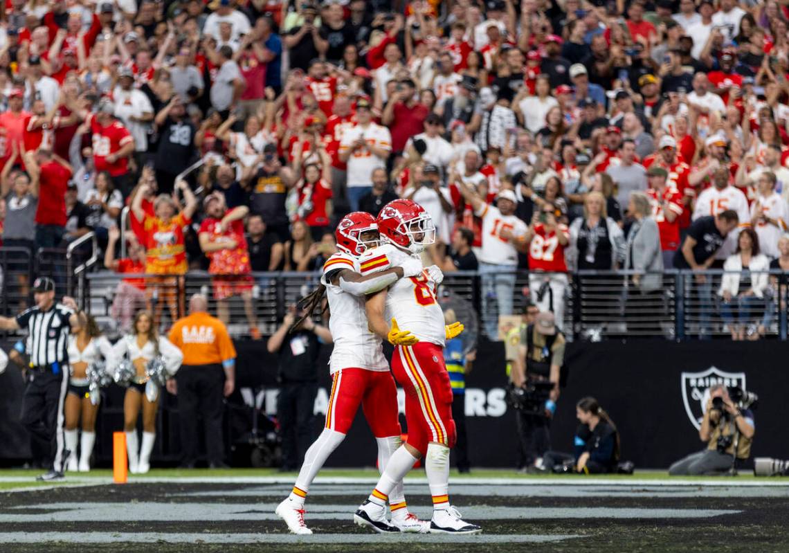 Kansas City Chiefs tight end Travis Kelce (87) celebrates with wide receiver DeAndre Hopkins (8 ...