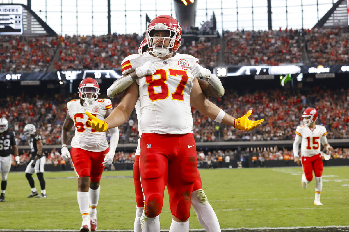 Kansas City Chiefs tight end Travis Kelce (87) reacts after scoring a touchdown during the firs ...