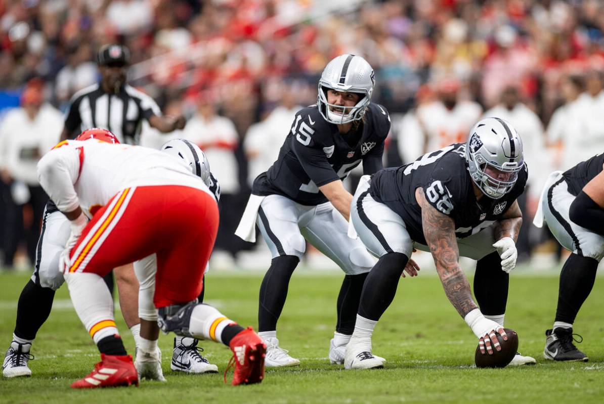 Raiders quarterback Gardner Minshew (15) looks to snap the ball during the first half of the NF ...