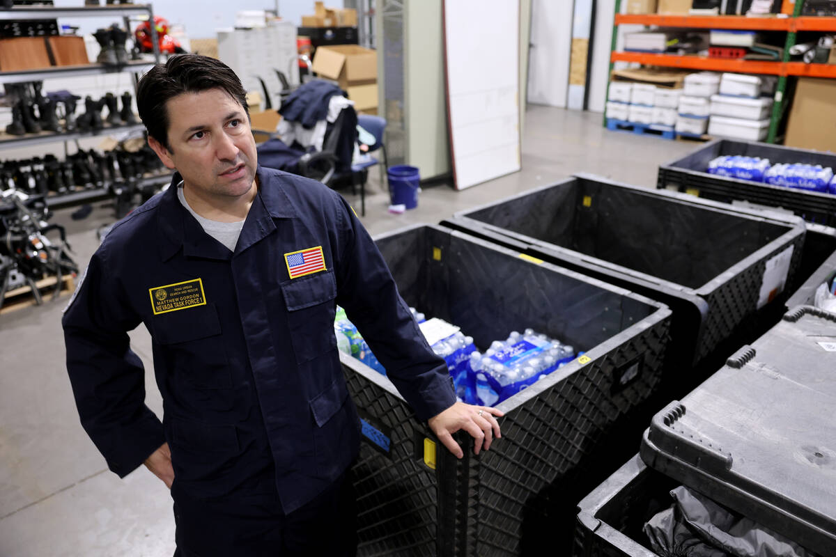 Nevada Task Force 1 team leader Matt Gordon talks to a reporter at the team’s warehouse ...