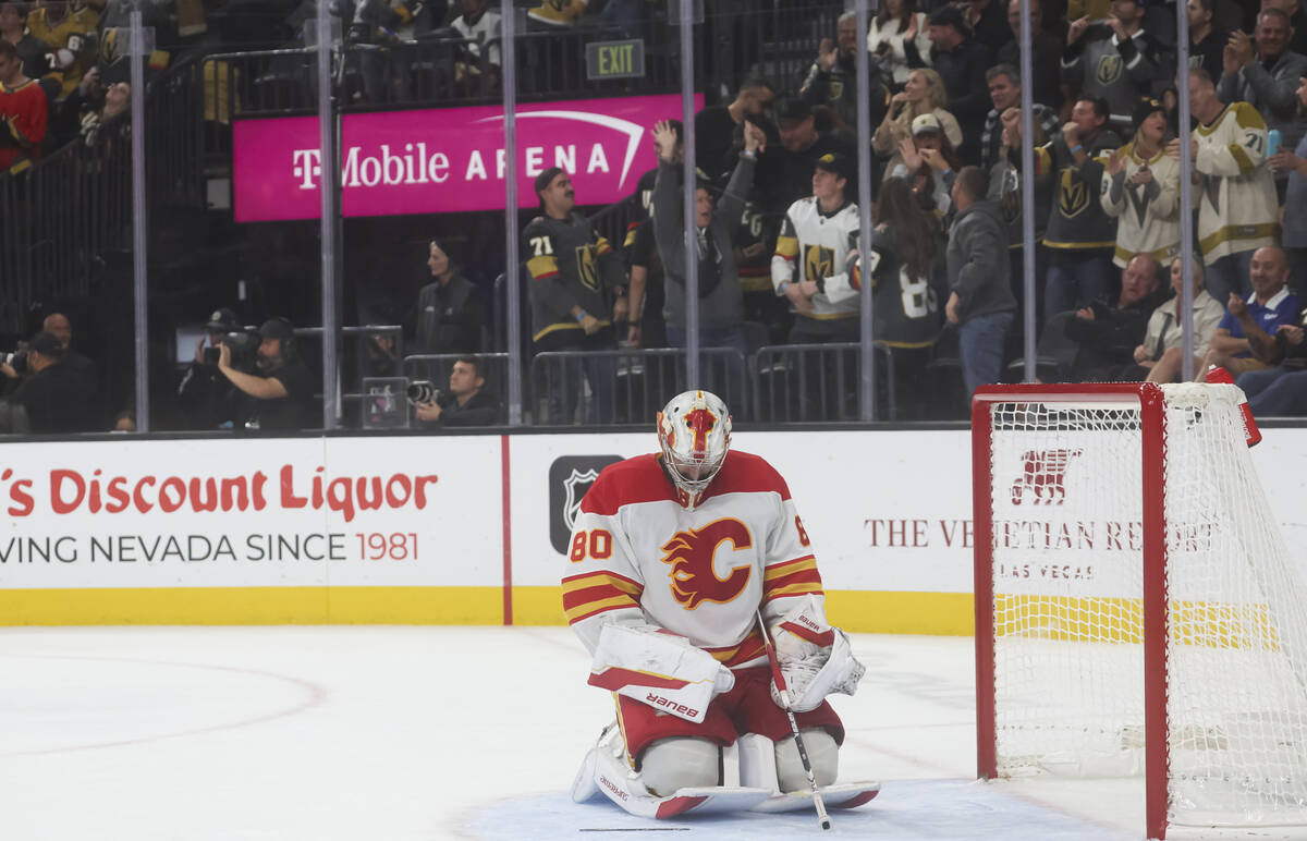 Calgary Flames goaltender Dan Vladar (80) looks down after giving up a goal the the Golden Knig ...