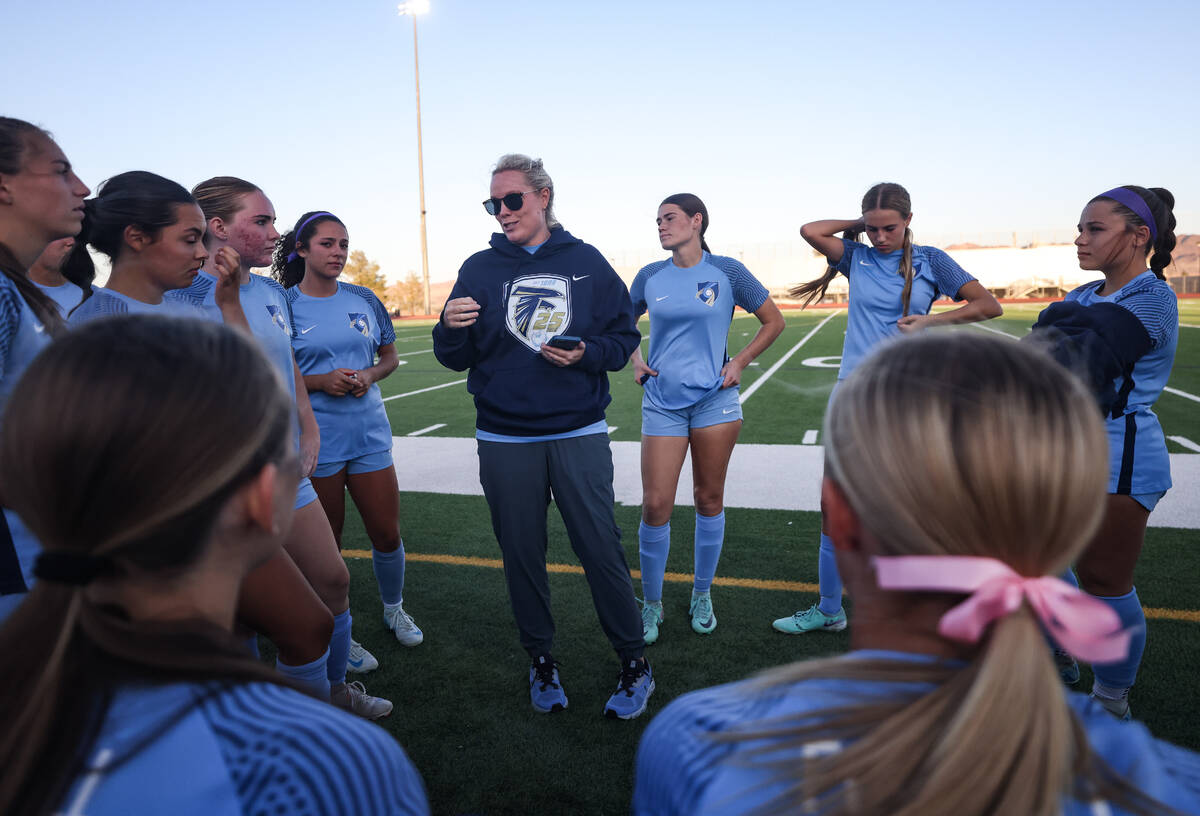 Foothill High School’s head coach Jennifer Schultz talks to her team during halftime at ...