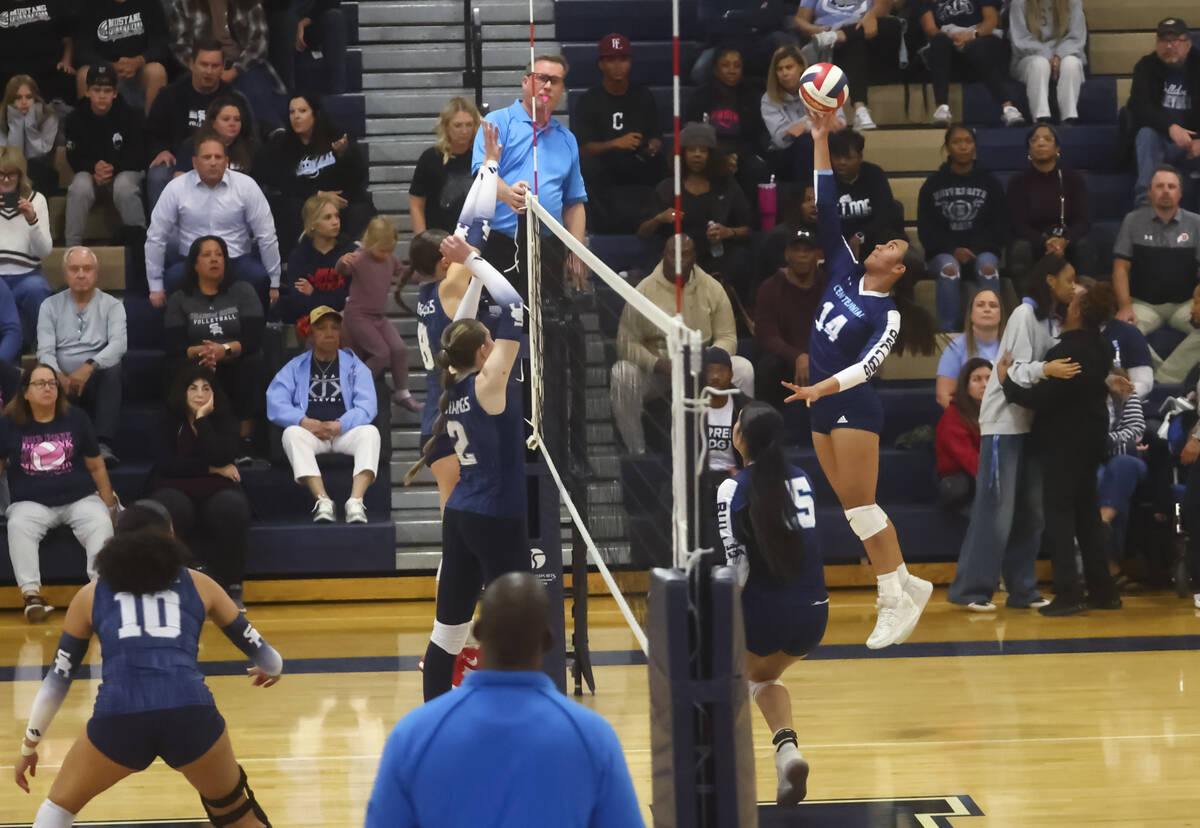 Centennia'sl Audrianne Bernard (14) hits the ball against Shadow Ridge during a Class 5A Southe ...