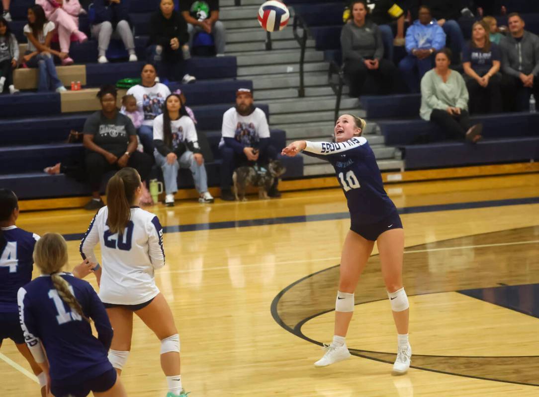 Centennial outside hitter Abby Vlaming (10) hits the ball over the net against Shadow Ridge dur ...