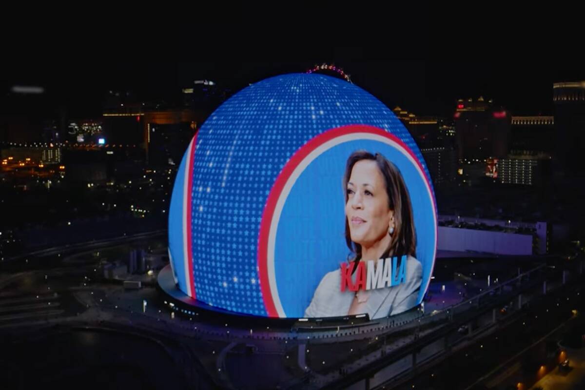 This screenshot from a YouTube video shows the exterior of the Sphere carrying messaging for th ...