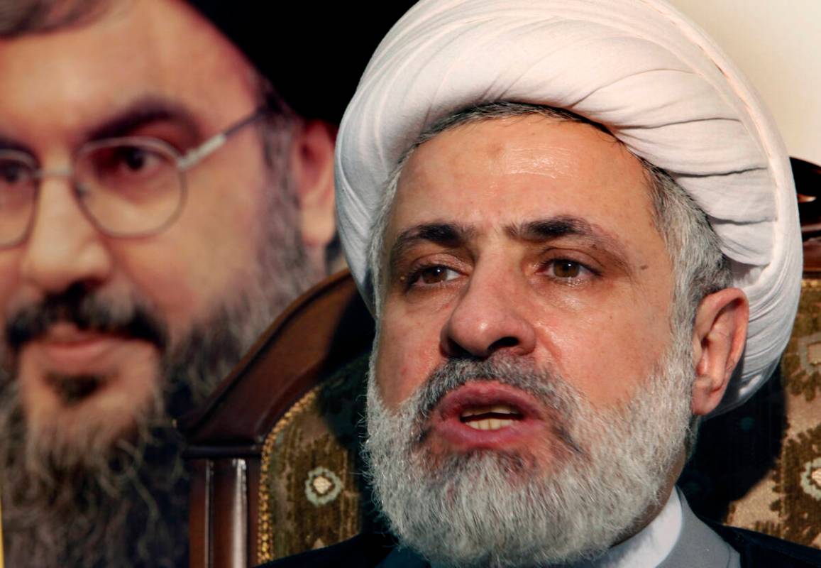 FILE - The deputy chief of Hezbollah, Sheik Naim Kassem, speaks during an interview with the As ...