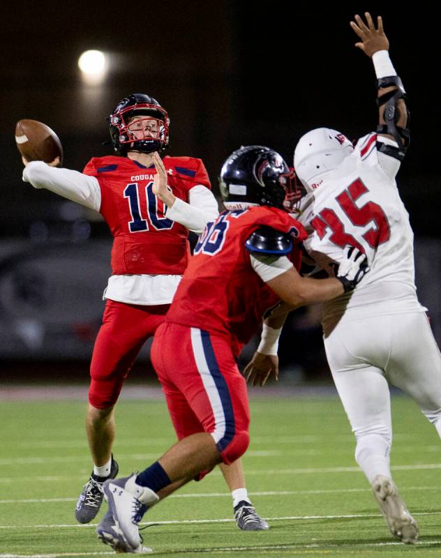 Coronado quarterback Aiden Krause (10) looks to pass the ball during the high school football g ...