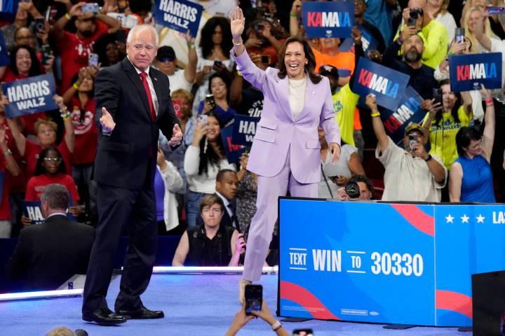 Democratic presidential nominee Vice President Kamala Harris, right, and running mate Minnesota ...