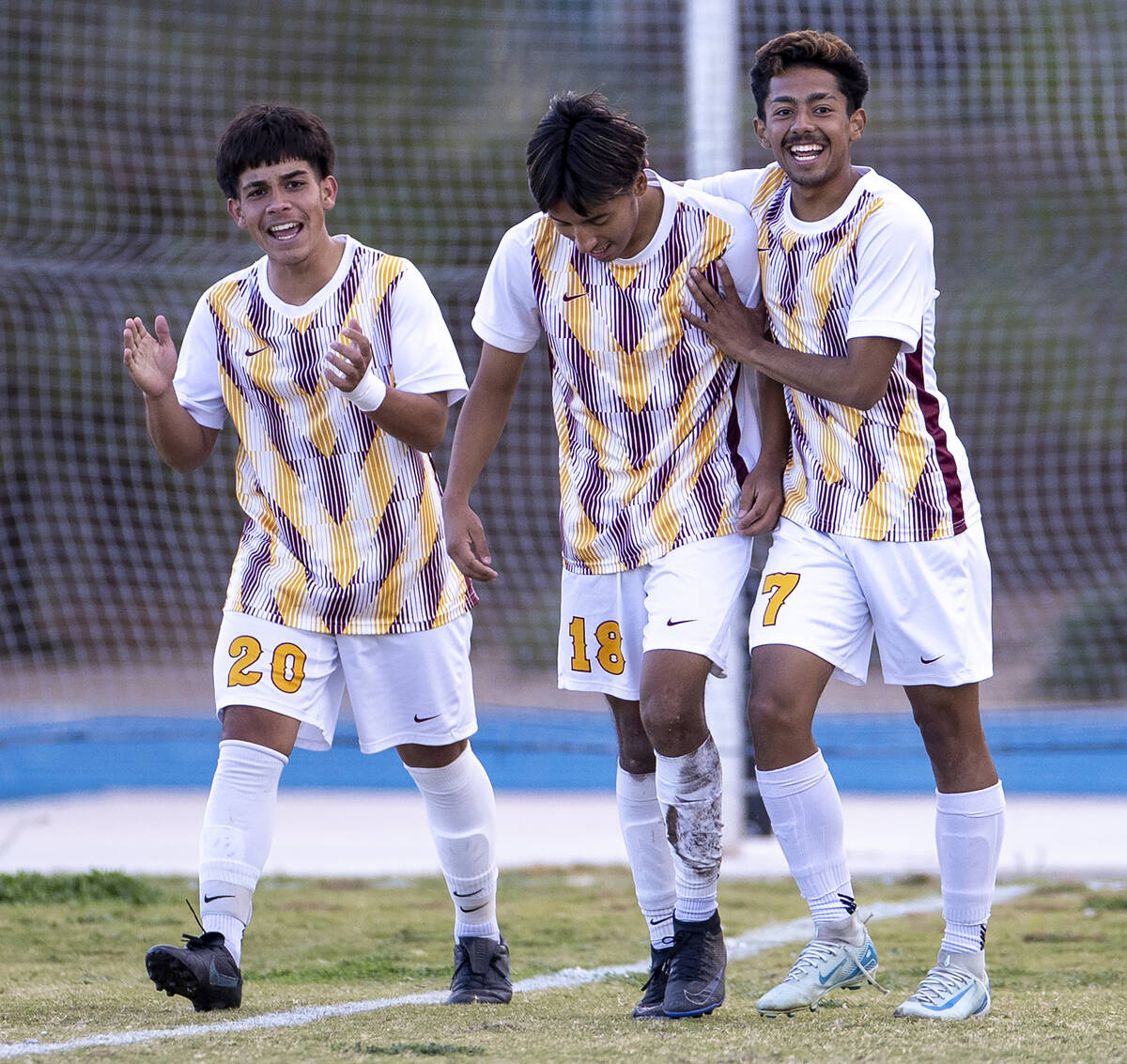 Eldorado senior Henyor Archila (18) celebrates with teammates after scoring a goal during the C ...