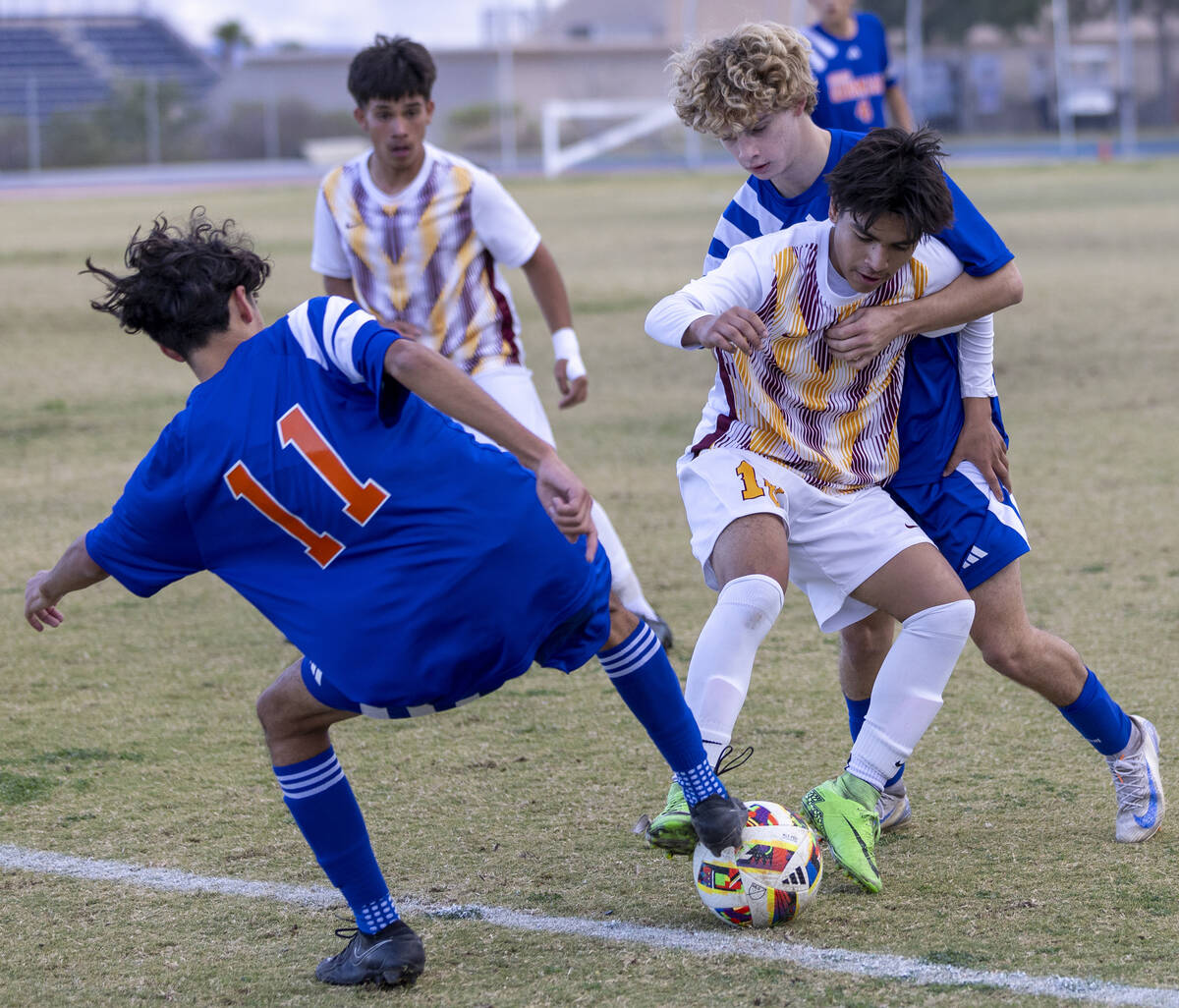 Eldorado forward Abraham Chavez, front, and Bishop Gorman defender Torin Davis, back, compete f ...