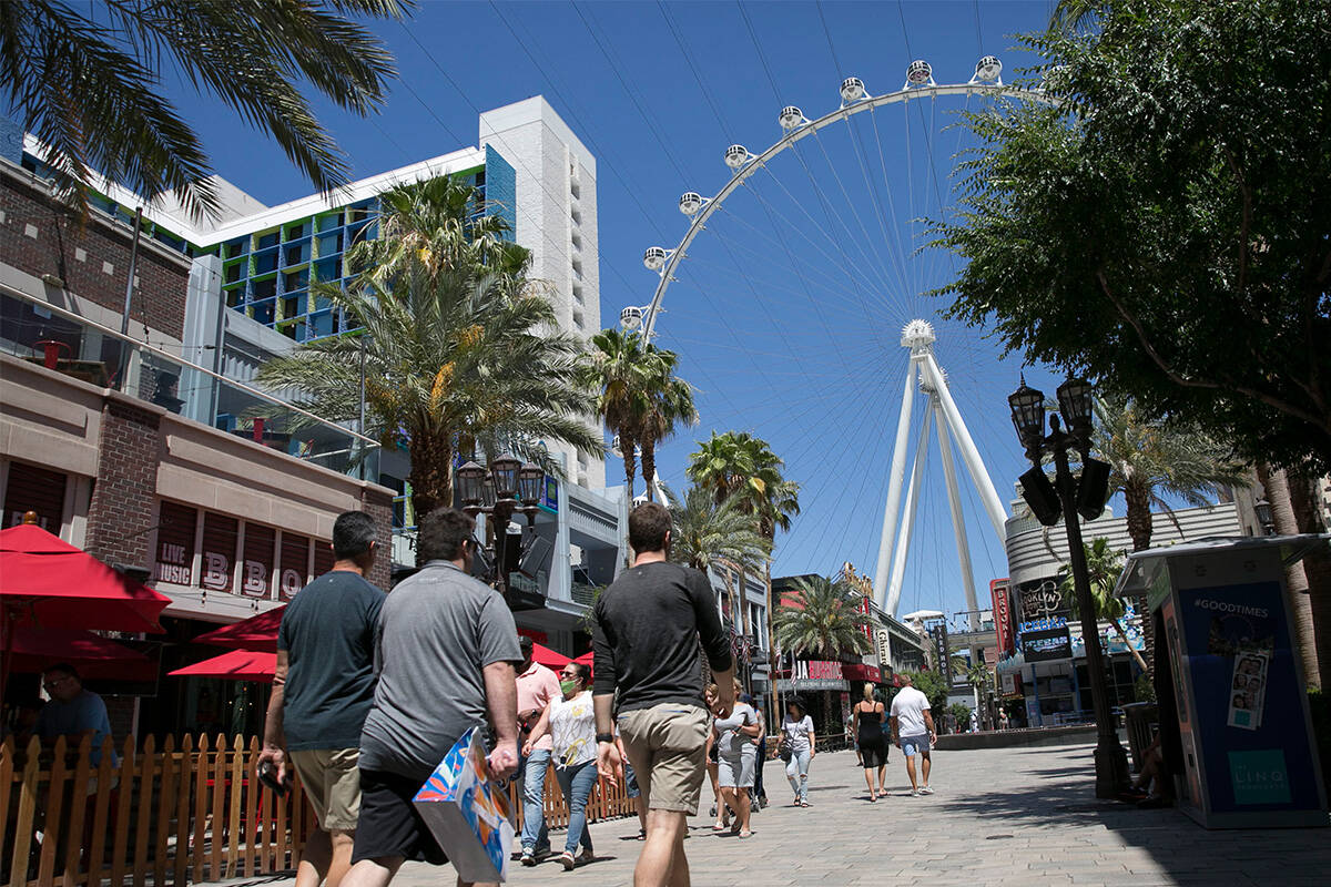 Tourists walk at The Linq Promenade on Sunday, June 7, 2020, in Las Vegas. (Bizuayehu Tesfaye/L ...