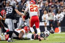 Raiders quarterback Gardner Minshew (15) fumbles the ball during the second half of the NFL foo ...