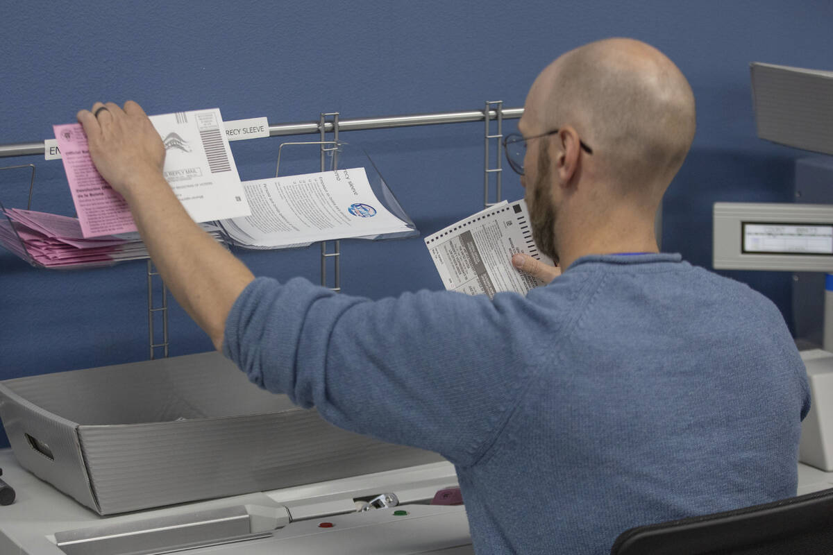 Washoe County election workers sort ballots at the Registrar of Voters Office in Reno, Nev., on ...