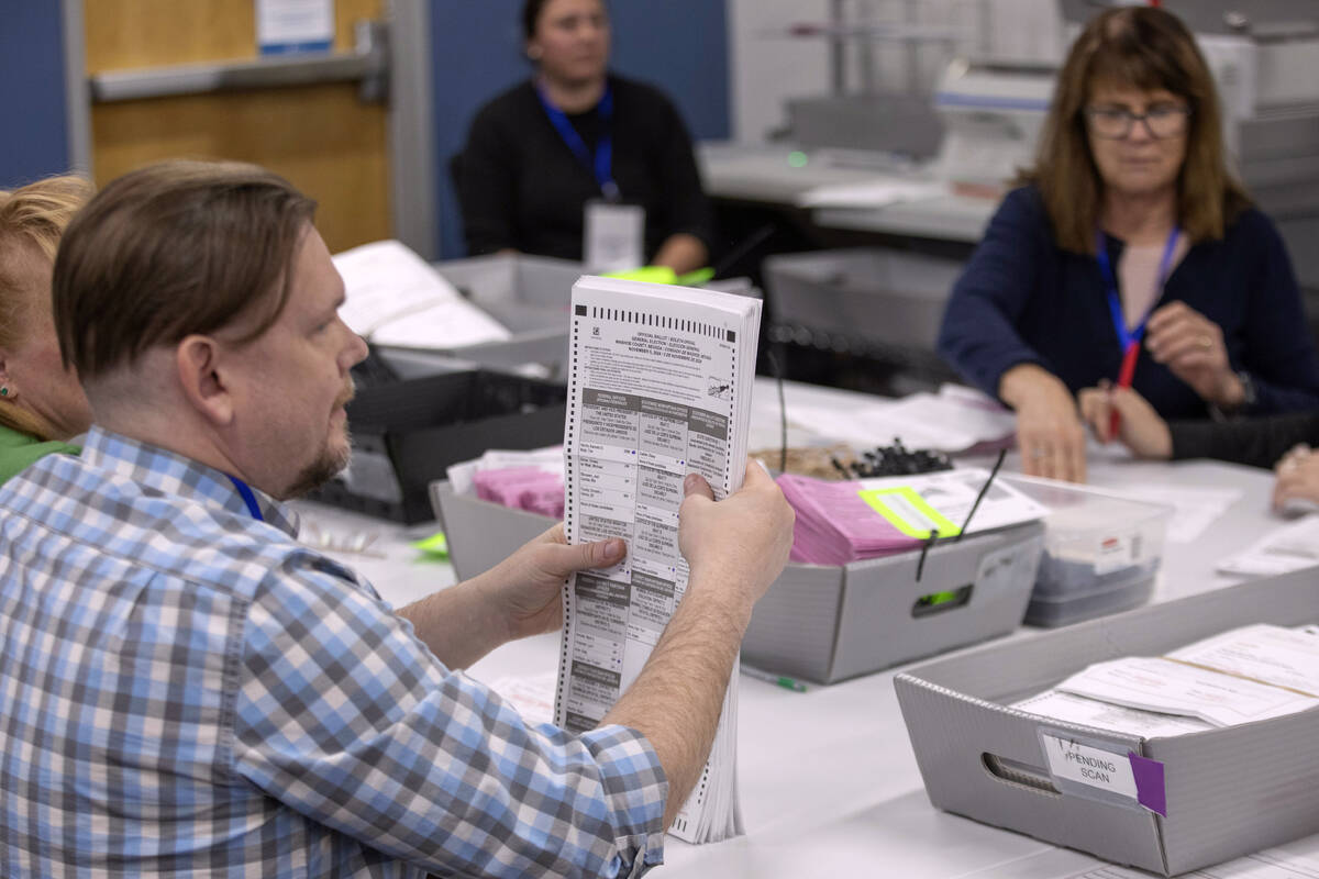 Washoe County election workers sort ballots at the Registrar of Voters Office in Reno, Nev., Tu ...