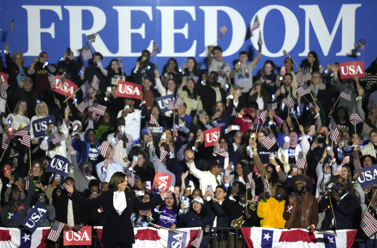 Democratic presidential nominee Vice President Kamala Harris gestures during a campaign rally o ...