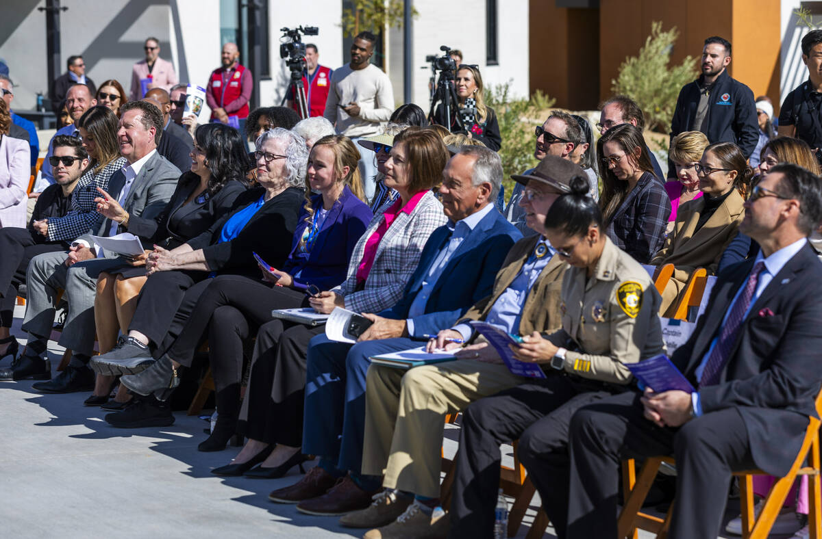 Invited dignitaries and administrators listen to a speaker during the St. Jude’s Ranch f ...