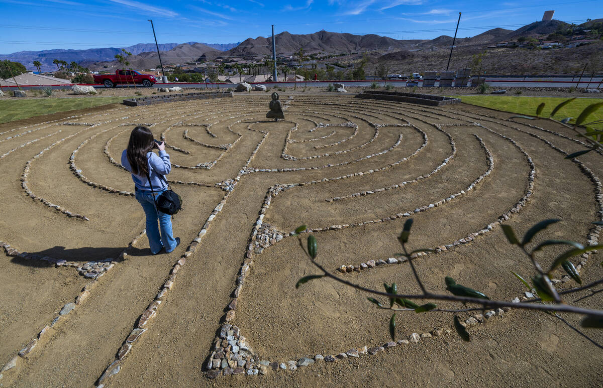 An invited guest views a labyrinth inspired by trafficking survivor and advocate Amy Ayoub duri ...