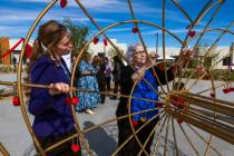 St. Jude’s Ranch for Children program development coordinator Annika Huff, left, looks o ...