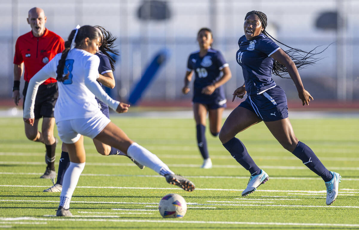 Centennial forward Natalie Penniston-John (11) eyes a ball as Canyon Springs defender Carolina ...