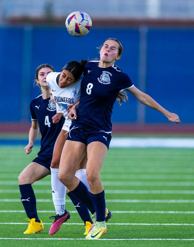 Centennial forward Claire Orme (8) and Canyon Springs midfielder Daniela Mayorga (7) collide on ...