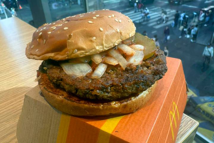 A McDonald's Quarter Pounder hamburger is shown in this photograph, in New York's Times Square, ...