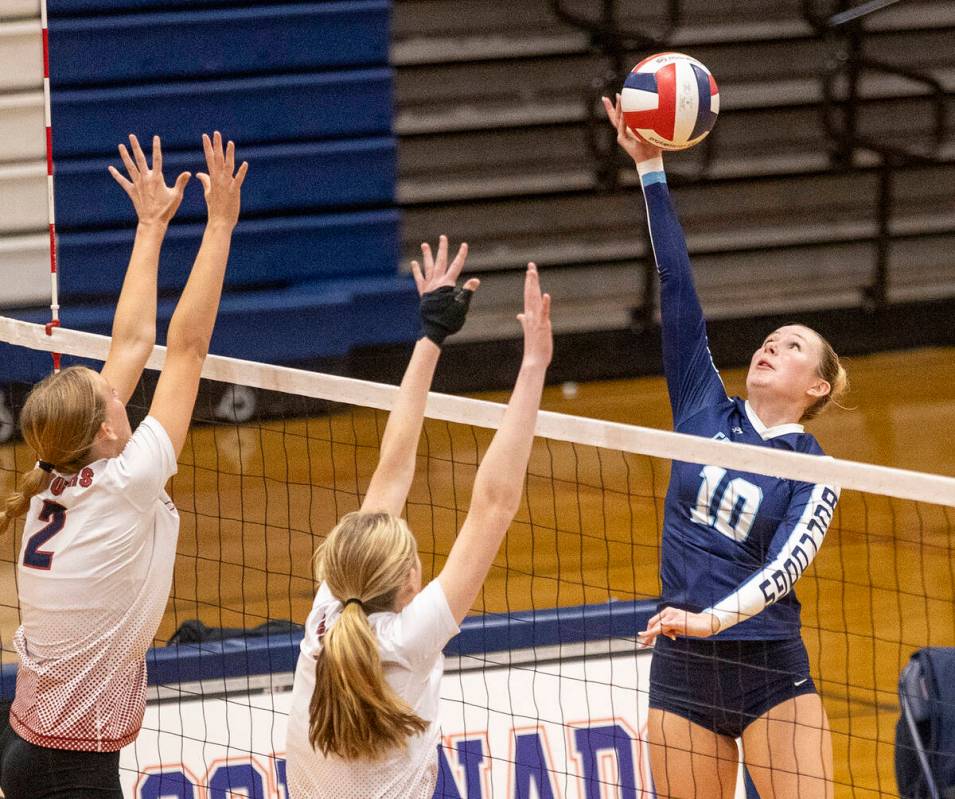 Centennial senior Abby Vlaming (10) taps the ball over the net during the 5A girls volleyball S ...