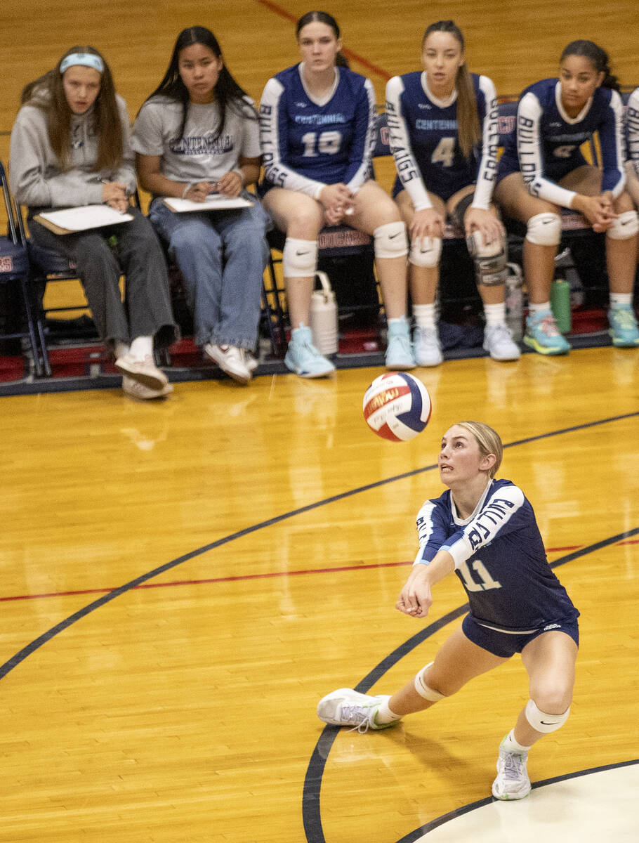 Centennial sophomore Olivia Roberts (11) receives the ball during the 5A girls volleyball South ...