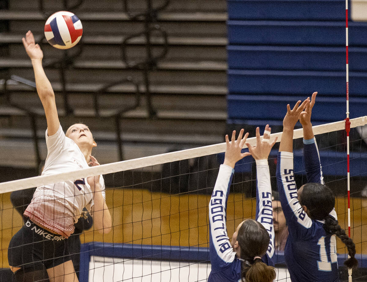 Coronado junior Julie Beckham (2) spikes the ball during the 5A girls volleyball Southern Regio ...