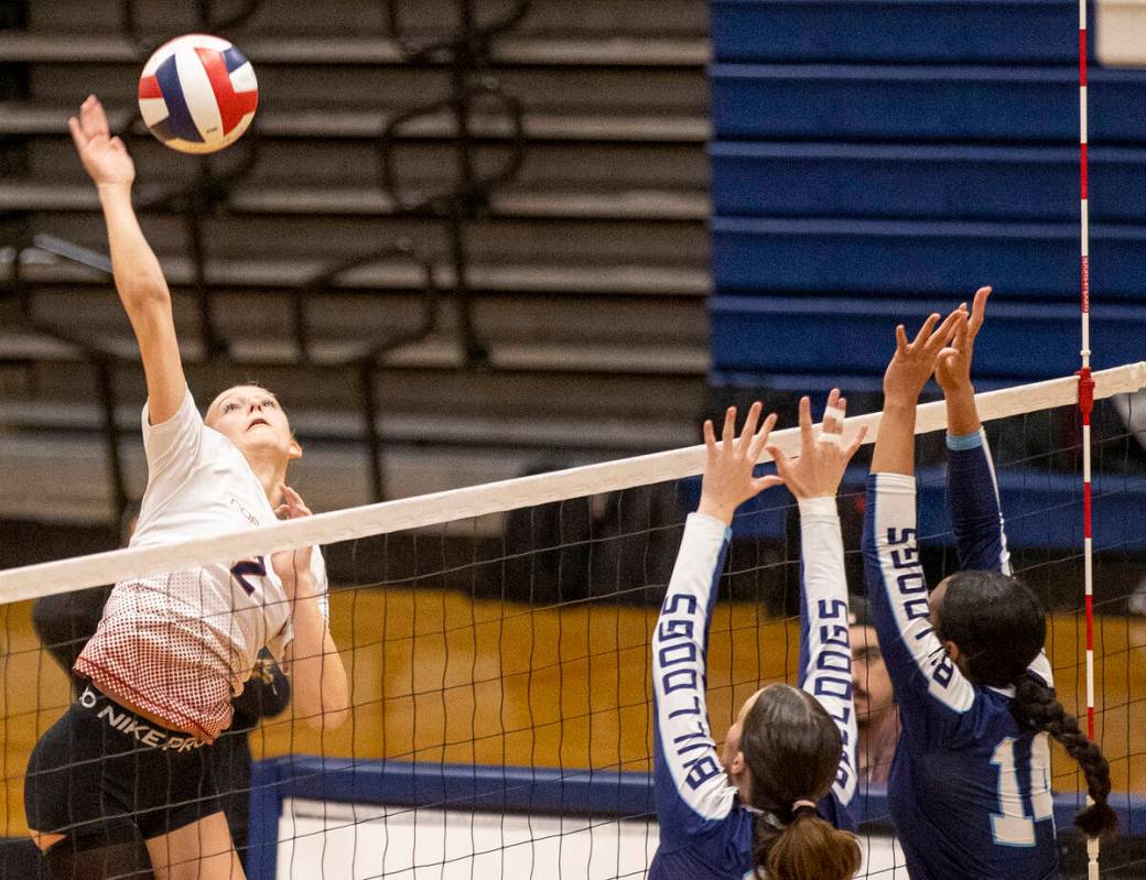 Coronado junior Julie Beckham (2) spikes the ball during the 5A girls volleyball Southern Regio ...