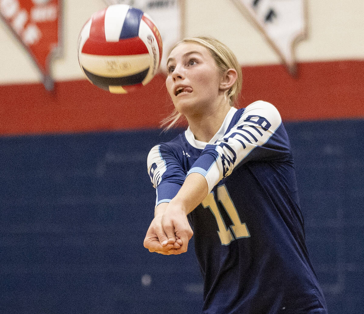 Centennial sophomore Olivia Roberts (11) receives the ball during the 5A girls volleyball South ...