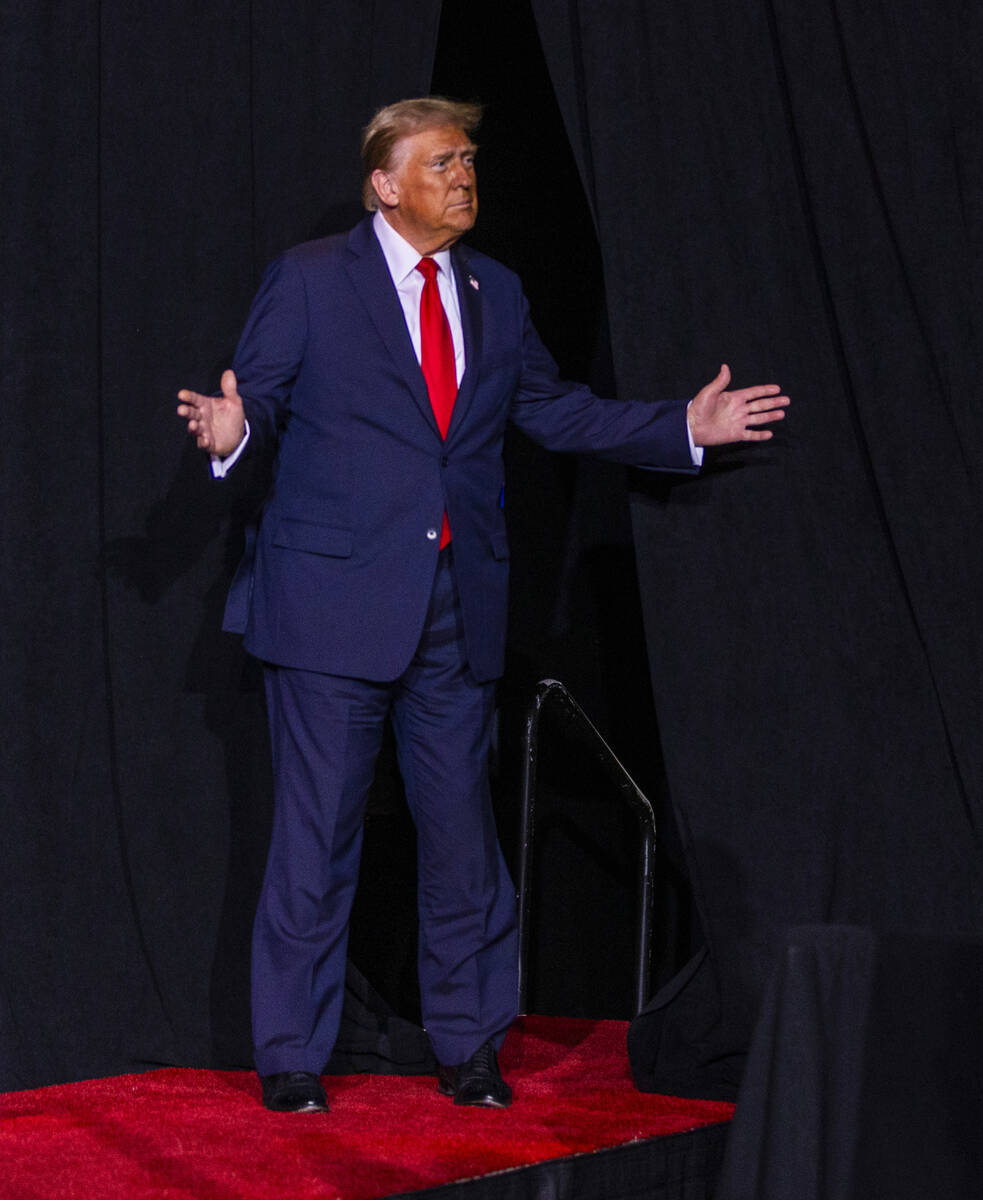 Former President Donald Trump arrives to speak during a rally at the Lee's Family Forum on Thur ...