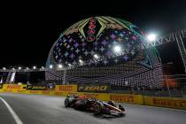 FILE - Red Bull driver Max Verstappen, of the Netherlands, drives past the Sphere during the Fo ...